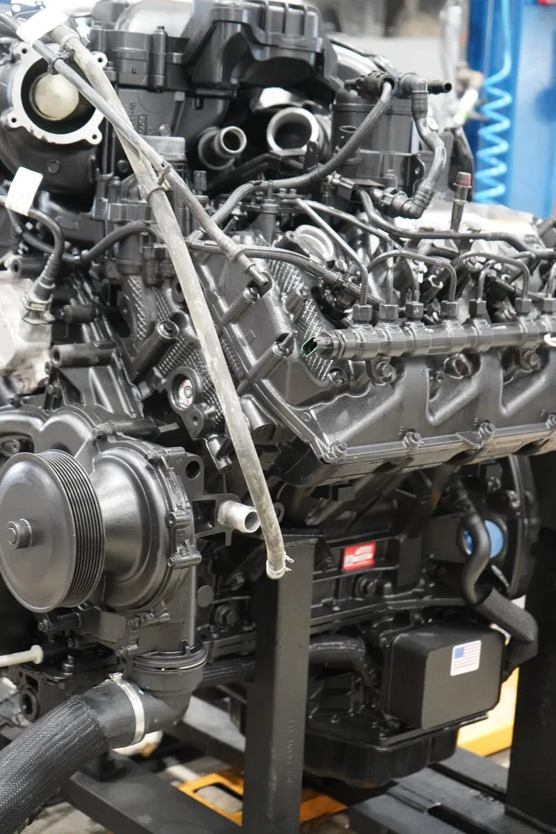 Clean engine assembly showing timing, water pump and intake components